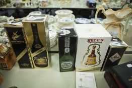 BELLS SCOTCH WHISKY (BOXED), ROYAL MINT LIQUEUR AND A BOXED I.W. HARPER 12 YEAR OLD DECANTER WHISKEY