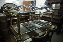 A MODERN GLASS TOP COFFEE TABLE