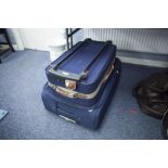 'CALVIN KLEIN', LARGE BLUE CANVAS SUITCASE WITH WHEELS 30" X 20" AND AN 'EQUATER' BLACK CANVAS AND