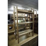 A PINE BEDROOM SINGLE CHAIR WITH CANE SEAT AND A SMALL OAK THREE TIER OPEN BOOKCASE (2)