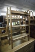 A PINE BEDROOM SINGLE CHAIR WITH CANE SEAT AND A SMALL OAK THREE TIER OPEN BOOKCASE (2)