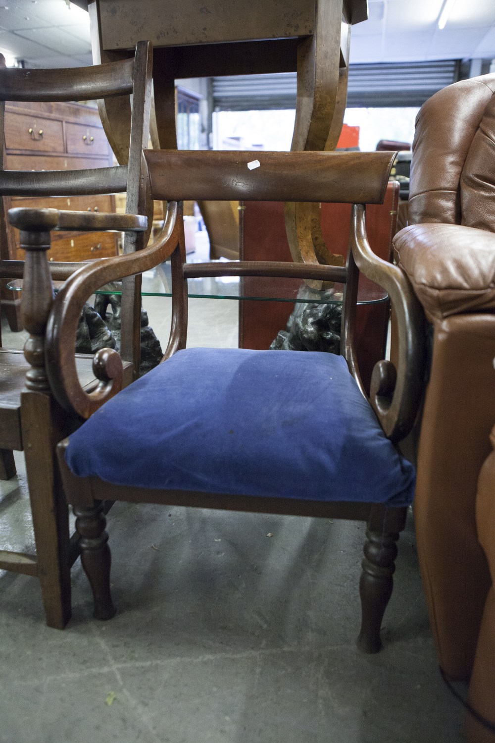 REGENCY MAHOGANY CARVED ARMCHAIR, WITH SCROLL ARMS (LEGS CUT DOWN AND BACK REPAIRED)