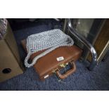 A LADY'S ESCAMA STUDIO ALUMINUM LINK PATTERN HANDBAG AND A 'SKYFLITE' TAN COLOURED ATTACHÉ CASE WITH