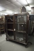 A MAHOGANY DWARF BOOKCASE WITH ASTRAGAL GLAZED DOOR (A.F.)