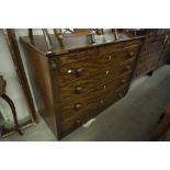 AN EARLY VICTORIAN MAHOGANY CHEST WITH THREE SHALLOW FRIEZE DRAWERS, OVER FOUR GRADUATED LONG