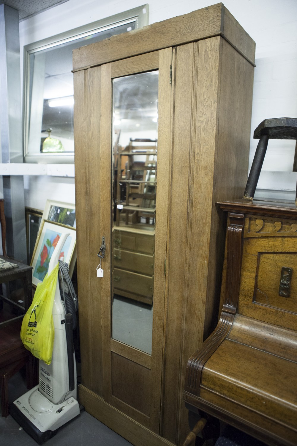 AN OAK WARDROBE WITH MIRROR DOOR, 2'6" WIDE