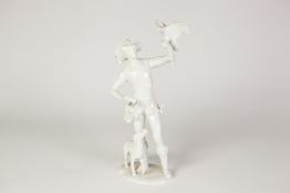 KAISER, GERMAN WHITE GLAZED PORCELAIN FIGURE OF A FALCONER, modelled with a bird on a glove and a