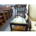 AN ANTIQUE MAHOGANY SINGLE CHAIR WITH THREE RAIL BACK, ON SQUARE TAPERING LEGS