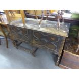 A DARK OAK SIDEBOARD CIRCA 1930's WITH TWO DOOR CUPBOARD 'X' BEAD DETAIL, PIERCED FLORAL PEDIMENT,