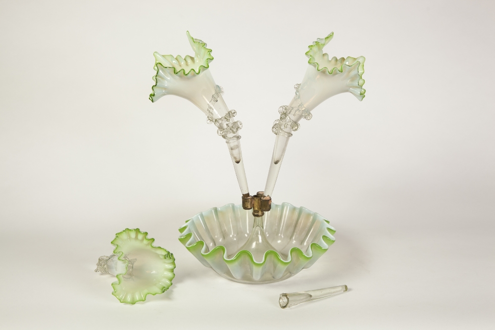 VICTORIAN GREEN TINTED VASELINE GLASS TABLE EPERGNE, the three trumpet vases, issued from a circular