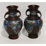 PAIR OF CHINESE CLOISONNE AND PATINATED METAL TWO HANDLED VASES, each of baluster form, with mask