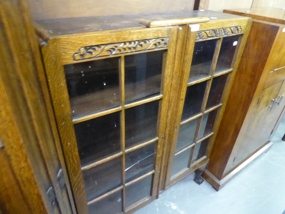 AN OAK TWO TIER BOOK TABLE/ COFFEE TABLE WITH CANTED CORNERS