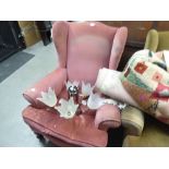 A PAIR OF EARLY TWENTIETH CENTURY WINGED FIRESIDE ARMCHAIRS, COVERED IN VELVET