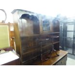 AN EARLY TWENTIETH CENTURY REPRODUCTION OAK DRESSER, ON CABRIOLE FORELEGS