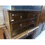 A VICTORIAN MAHOGANY LOW CHEST OF DRAWERS, RAISED BACK OVER TWO SHORT AND ONE LONG DRAWER, ON SQUARE