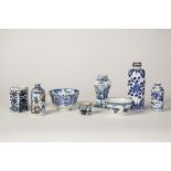 FOUR NINETEENTH CENTURY CHINESE PORCELAIN MINIATURE VASES, each painted in underglaze blue, one with