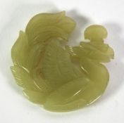 CHINESE YELLOW/GREEN JADE CARVING, IN THE FORM OF A FLATTENED PHOENIX PENDANT, 1 15/16" (5cm)