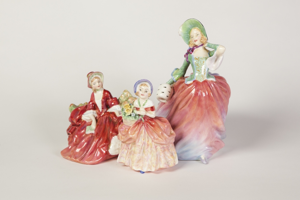 THREE ROYAL DOULTON CHINA FIGURES; 'Autumn Breezes', HN 1911, 8" (20.3cm) high, 'Lydia', HN 1809 (