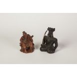 ORIENTAL CARVED REDWOOD FIGURE, modelled as an elderly man seated, 3 3/4" (9.5cm) high, carved