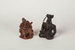 ORIENTAL CARVED REDWOOD FIGURE, modelled as an elderly man seated, 3 3/4" (9.5cm) high, carved