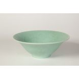 A PILKINGTONS ROYAL LANCASTRIAN POTTERY MONOCHROME TURQUOISE/ GREEN GLAZED RIBBED AND FLARED BOWL,