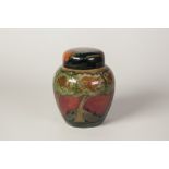 WILLIAM MOORCROFT 'EVENTIDE' PATTERN TUBE LINED POTTERY GINGER JAR AND COVER, of typical form, 5 1/
