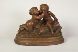 NINETEENTH CENTURY FRENCH TERRACOTTA GROUP, Signed Cholin, modelled as two putti embracing, raised