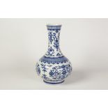 TWENTIETH CENTURY CHINESE BLUE AND WHITE PORCELAIN VASE, of compressed footed form with tall,