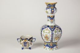 A LATE NINETEENTH/EARLY TWENTIETH CENTURY FRENCH FAYENCE BALUSTER SHAPE VASE in blue and