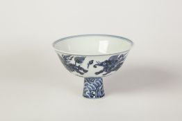NINETEENTH/TWENTIETH CENTURY CHINESE BLUE AND WHITE PORCELAIN STEM CUP, of flared form, the exterior
