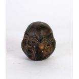 A CURIOUS ORIENTAL PATINATED COPPER ALLOY WEIGHT of rounded square form, on each side a different