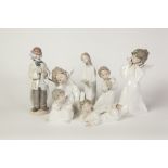 SEVEN LLADRO, SPANISH PORCELAIN FIGURES, comprising; one modelled as a CLOWN with saxophone, ANOTHER