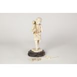 JAPANESE MEIJI PERIOD CARVED SECTIONAL IVORY FIGURE MAN, carrying a gourd on his shoulder and a
