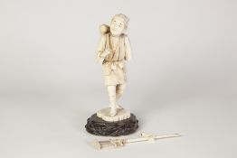 JAPANESE MEIJI PERIOD CARVED SECTIONAL IVORY FIGURE MAN, carrying a gourd on his shoulder and a