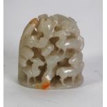 A CHINESE QING DYNASTY PALE CELADON CARVING with small russet inclusions in the form of six deer