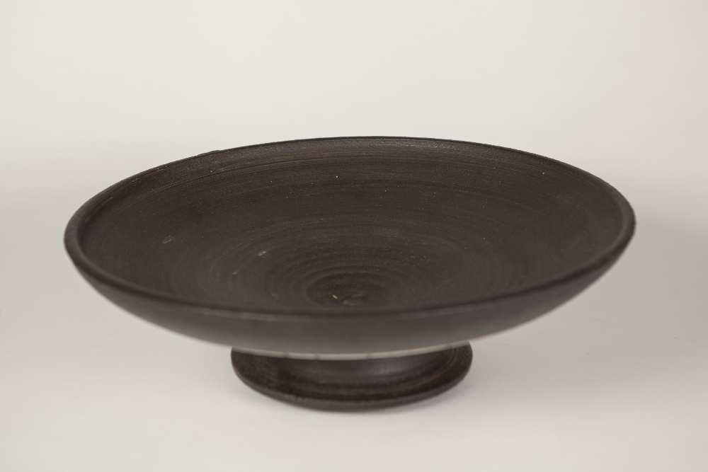 THREE STUDIO POTTERY SHALLOW FOOTED DISHES, all with matt black exterior, one with matching - Image 2 of 3