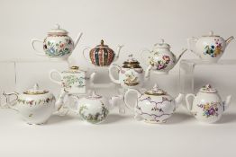 COLLECTION OF 'VICTORIA AND ALBERT' PORCELAIN MINIATURE TEAPOTS, issued by Franklin Mint,
