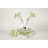 VICTORIAN GREEN TINTED VASELINE GLASS TABLE EPERGNE, the three trumpet vases, issued from a circular