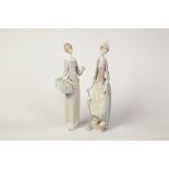 TWO LLADRO PORCELAIN FIGURES OF ELEGANT LADIES, one modelled with a parasol and a small dog at her