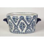 MODERN CHINESE REPRODUCTION BLUE AND WHITE PORCELAIN TWO HANDLED FISH BOWL OR PLANTER, of rounded