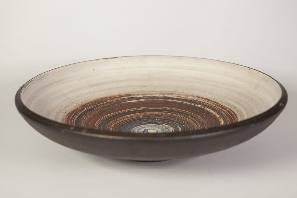THREE STUDIO POTTERY SHALLOW FOOTED DISHES, all with matt black exterior, one with matching - Image 3 of 3