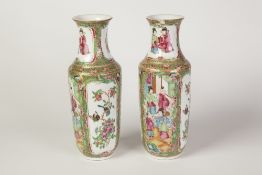 PAIR OF LATE NINETEENTH CENTURY CHINESE FAMILLE ROSE PORCELAIN VASES, each of footed cylindrical