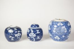 A NINETEENTH CENTURY CHINESE PORCELAIN BLUE AND WHITE GINGER JAR (minus cover) with prunus blossom