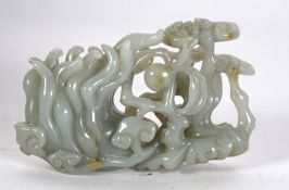 A GOOD CHINESE QING DYNASTY CELADON JADE CARVING OF BUDDHA'S HAND CITRON entwined with Lingzi