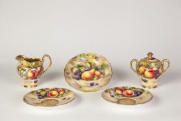 A 20TH CENTURY PORCELAIN 21 PIECE FRUIT PAINTED TEA SERVICE SIGNED H.R BUDD (21)