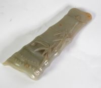 A GOOD CHINESE QING DYNASTY PALE CELADON JADE CARVING in the form of a half section of tapering