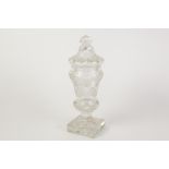 19th CENTURY HEAVY QUALITY CUT GLASS PEDESTAL VASE AND COVER of thistle form, the cover with slice
