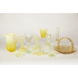 ELEVEN VARIOUS PIECES OF VASELINE GLASS INCLUDING JUGS, A HANDLED SHALLOW BOWL, TREE TRUNK FORM
