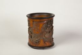 TWENTIETH CENTURY CHINESE CARVED BAMBOO BRUSH POT, decorated in high relief with figures and
