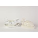 WEDGWOOD WHITE GLAZED STYLISED MODEL OF A RECUMBENT DEER, ON AN OBLONG BASE, HAND PAINTED NORITAKE